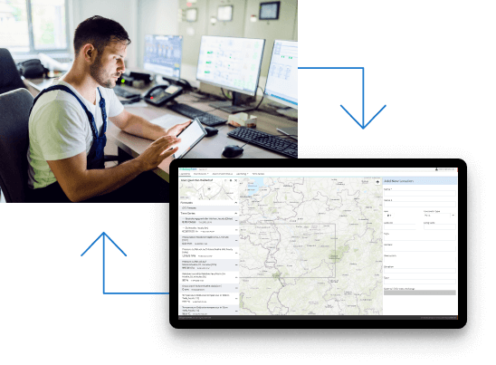 A man in an office monitors multiple screens while using a phone; arrows point between him and a computer screen displaying a digital map and data interface.